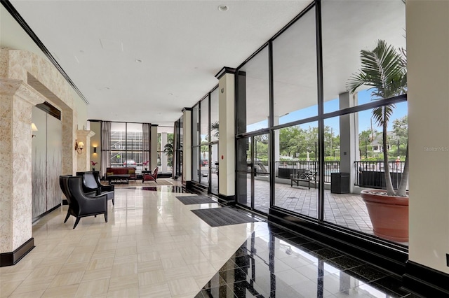 community lobby featuring floor to ceiling windows