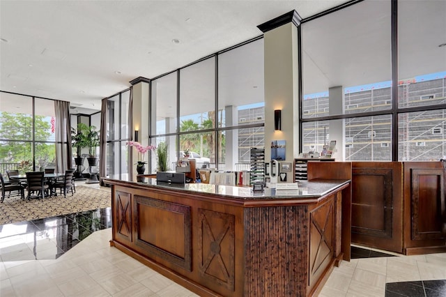reception area with a wall of windows
