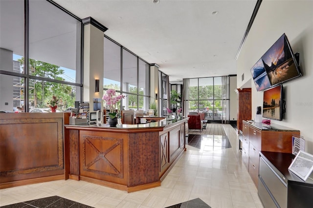 welcome area with floor to ceiling windows