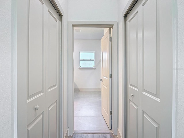 16253 SW 29th Court Rd, Ocala, FL 34473 - hallway featuring baseboards and wood finished floors