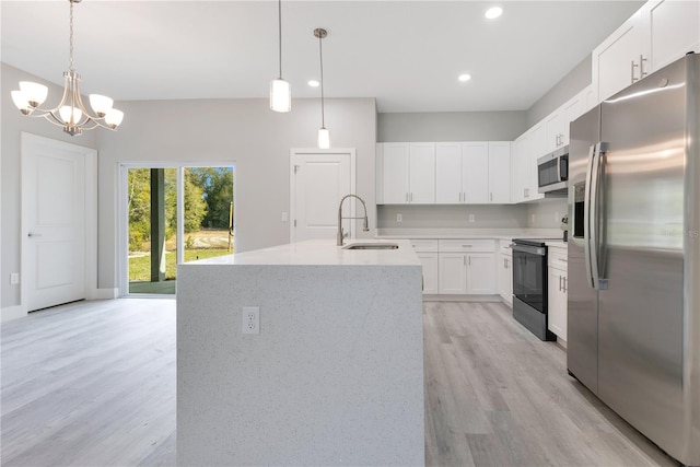 kitchen featuring stainless steel appliances, light wood-type flooring, white cabinets, recessed lighting, and a chandelier