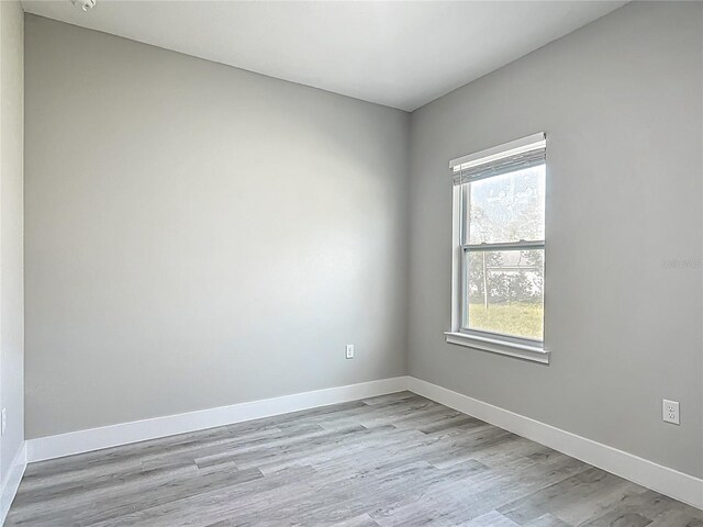 2531 SW 167th Loop, Ocala, FL 34473 - empty room featuring light wood-style floors and baseboards