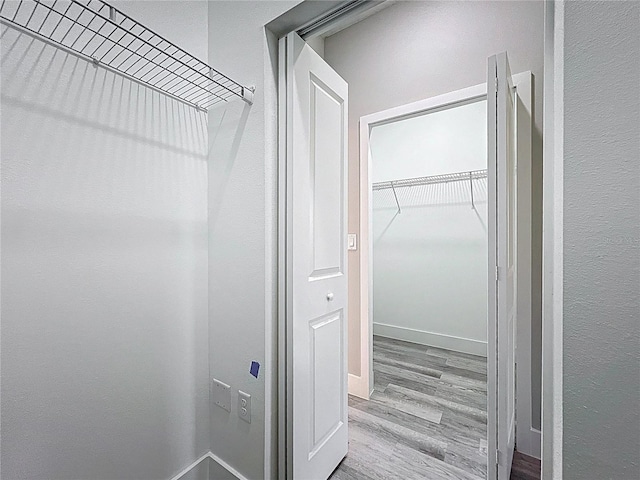 2531 SW 167th Loop, Ocala, FL 34473 - spacious closet featuring wood finished floors