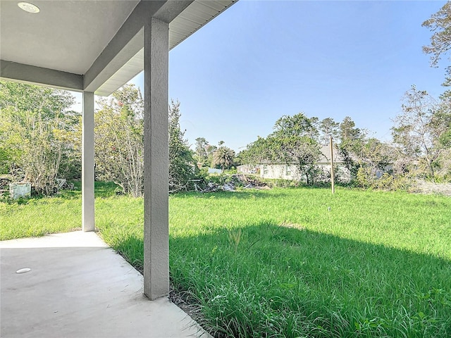 2531 SW 167th Loop, Ocala, FL 34473 - view of grassy yard featuring a patio area