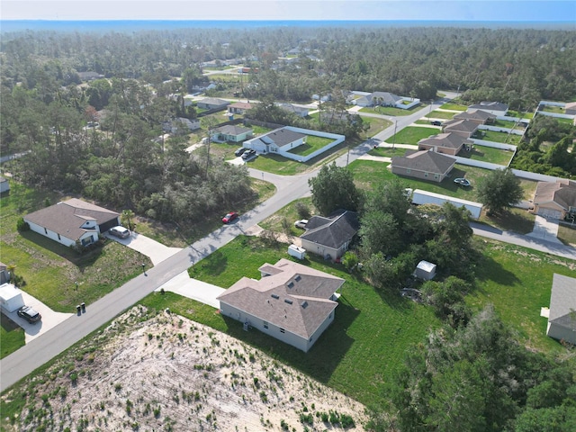 2531 SW 167th Loop, Ocala, FL 34473 - aerial view of property's location featuring nearby suburban area and a heavily wooded area