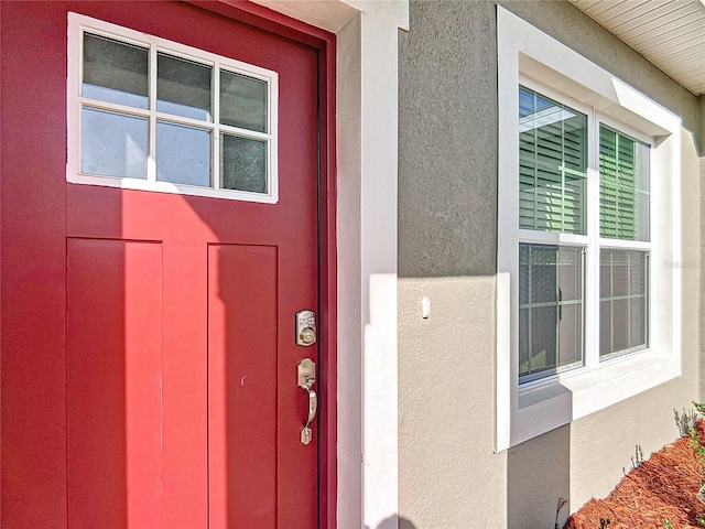 2531 SW 167th Loop, Ocala, FL 34473 - view of exterior entry with stucco siding
