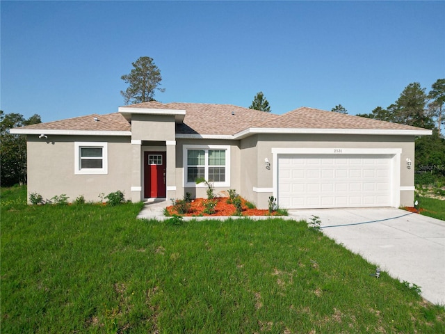 2531 SW 167th Loop, Ocala, FL 34473 - ranch-style home with a garage, stucco siding, driveway, and a front yard