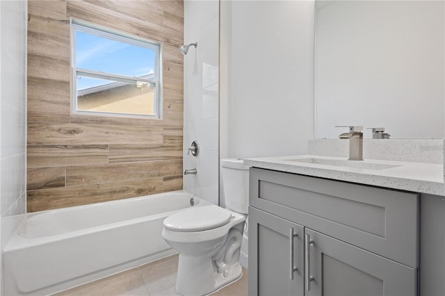 bathroom with toilet, shower / tub combination, vanity, and tile patterned floors