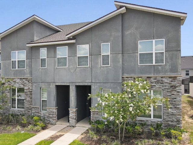1632 Tropical Palms Cir, Kissimmee, FL 34747 - contemporary house with stone siding and stucco siding