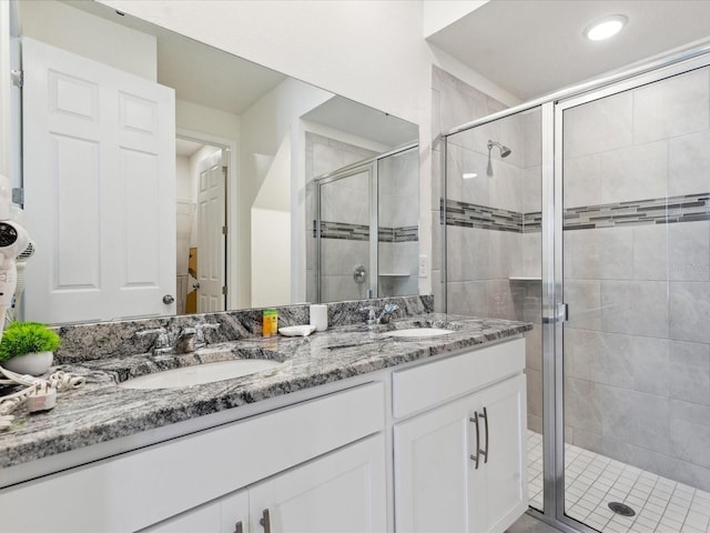 1632 Tropical Palms Cir, Kissimmee, FL 34747 - bathroom with a shower stall and double vanity