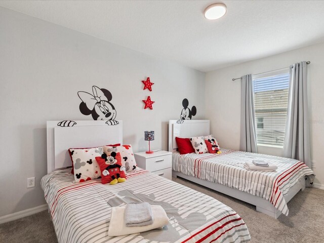 1632 Tropical Palms Cir, Kissimmee, FL 34747 - carpeted bedroom with baseboards
