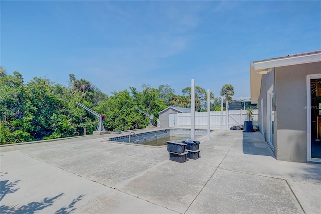 4838 Tarpon Ave, Bonita Springs, FL 34134 - view of pool featuring a patio, fence, an outbuilding, and a storage shed