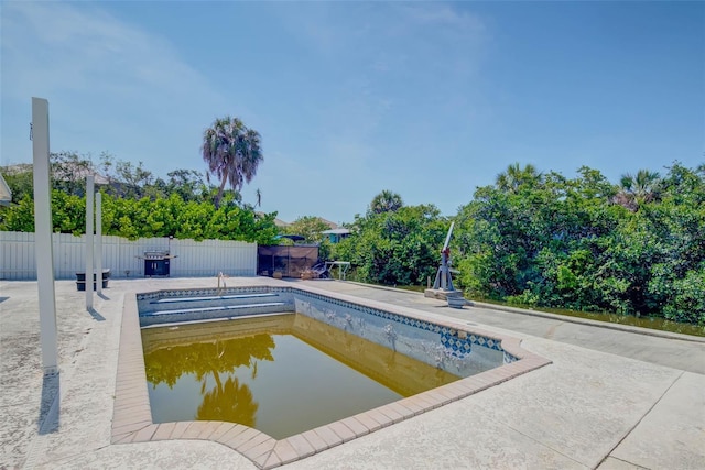 4838 Tarpon Ave, Bonita Springs, FL 34134 - view of swimming pool featuring a fenced backyard