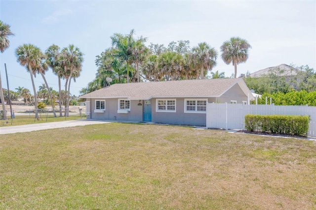 4838 Tarpon Ave, Bonita Springs, FL 34134 - ranch-style home with concrete driveway and stucco siding