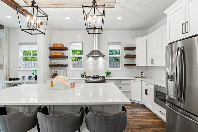 kitchen featuring stainless steel appliances, open shelves, a chandelier, and recessed lighting