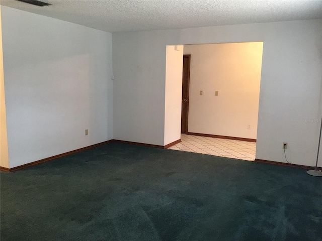 3152 Clewiston St, Deltona, FL 32738 - carpeted empty room with baseboards and tile patterned floors