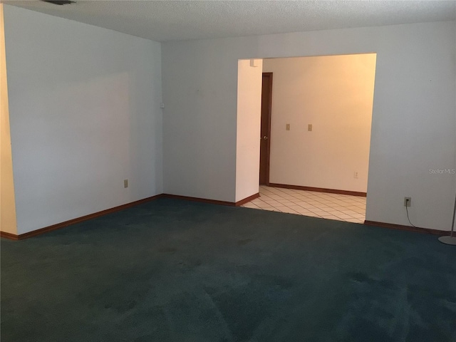 3152 Clewiston St, Deltona, FL 32738 - carpeted spare room with baseboards and tile patterned floors