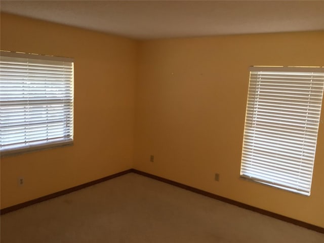 3152 Clewiston St, Deltona, FL 32738 - empty room featuring baseboards and carpet