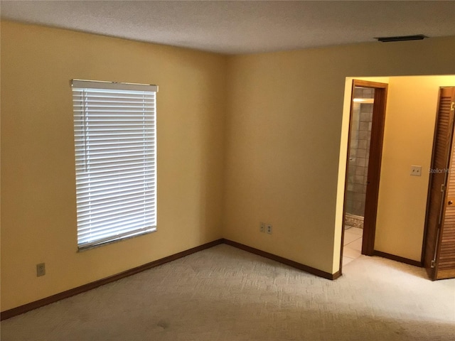 3152 Clewiston St, Deltona, FL 32738 - empty room with light colored carpet and baseboards