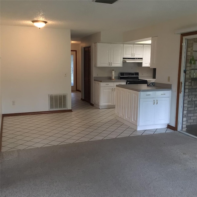 3152 Clewiston St, Deltona, FL 32738 - kitchen featuring electric range, under cabinet range hood, light carpet, light tile patterned floors, and white cabinets