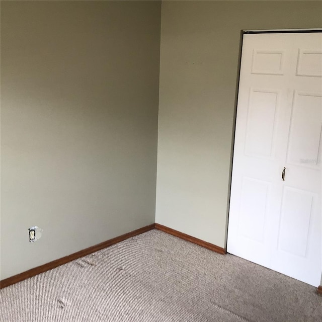 3152 Clewiston St, Deltona, FL 32738 - unfurnished bedroom featuring carpet and baseboards