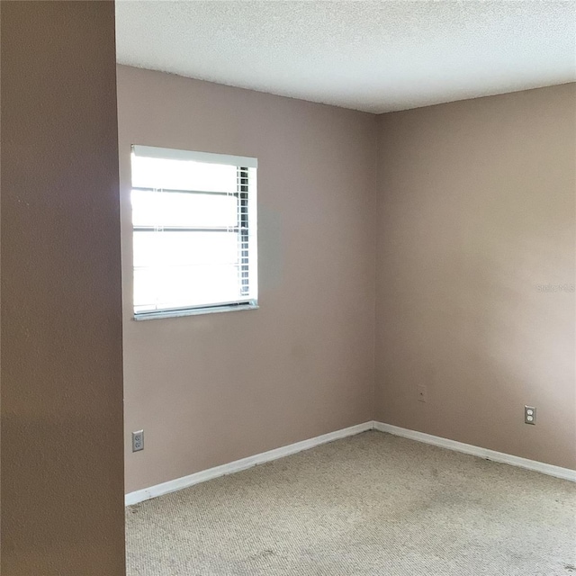 3152 Clewiston St, Deltona, FL 32738 - carpeted empty room with baseboards