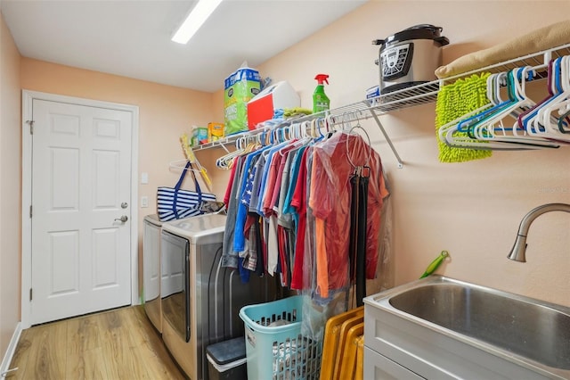 26609 Bull Run, Leesburg, FL 34748 - washroom featuring washer and dryer and light wood-type flooring