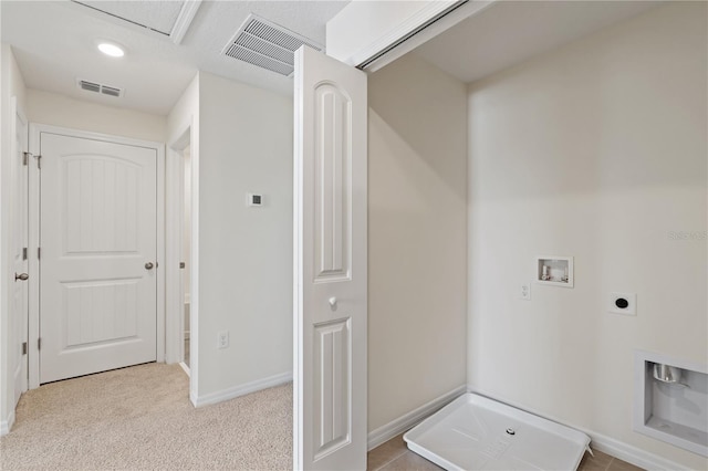 17081 Water Spring Blvd, Winter Garden, FL 34787 - clothes washing area with electric dryer hookup, washer hookup, baseboards, and carpet floors
