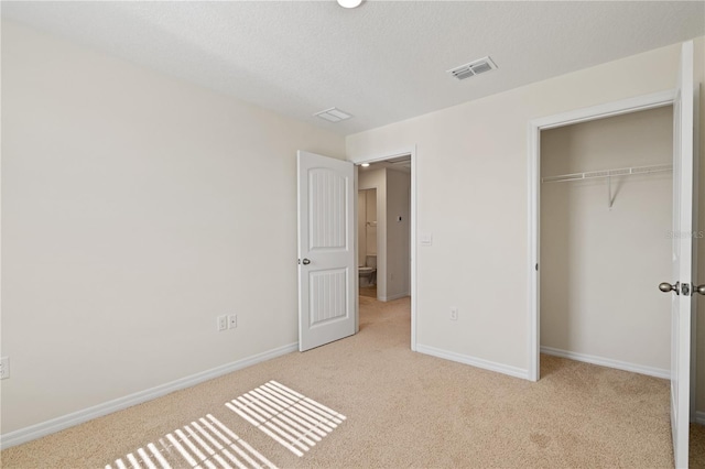 17081 Water Spring Blvd, Winter Garden, FL 34787 - unfurnished bedroom with carpet, baseboards, and a closet