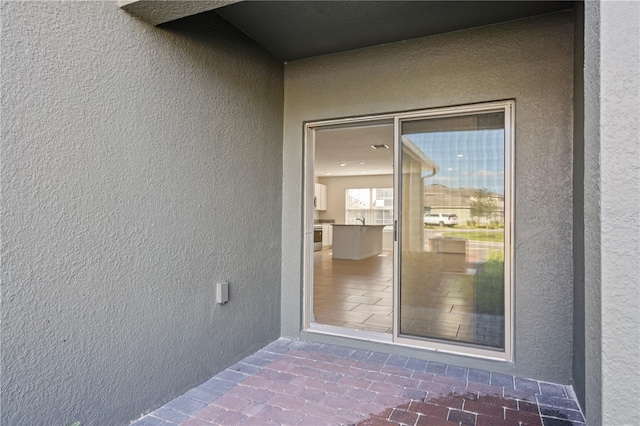 17081 Water Spring Blvd, Winter Garden, FL 34787 - property entrance featuring stucco siding