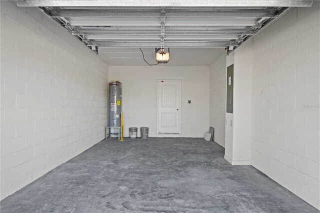 17081 Water Spring Blvd, Winter Garden, FL 34787 - garage featuring electric water heater, electric panel, and concrete block wall
