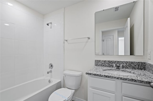 17081 Water Spring Blvd, Winter Garden, FL 34787 - bathroom with toilet, vanity, shower / bath combination, and baseboards