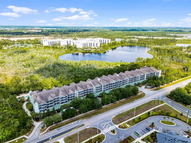 14200 Avalon Rd Unit 409, Winter Garden, FL 34787 - aerial view of property and surrounding area featuring a nearby body of water and property boundaries highlighted