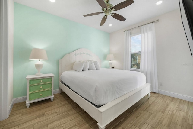 8045 Lost Shaker Ln, Kissimmee, FL 34747 - bedroom with wood finished floors, recessed lighting, and a ceiling fan