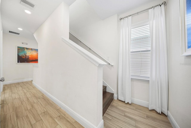 8045 Lost Shaker Ln, Kissimmee, FL 34747 - hall with stairs, light wood-type flooring, and recessed lighting