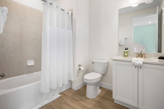 8045 Lost Shaker Ln, Kissimmee, FL 34747 - full bathroom with vanity, shower / bathtub combination with curtain, and wood finished floors