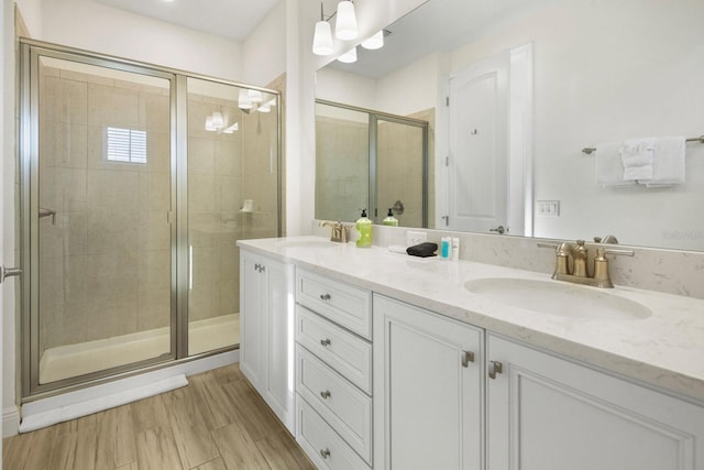 8045 Lost Shaker Ln, Kissimmee, FL 34747 - full bathroom with double vanity and a stall shower