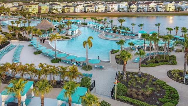 8045 Lost Shaker Ln, Kissimmee, FL 34747 - community pool featuring a residential view and a water view