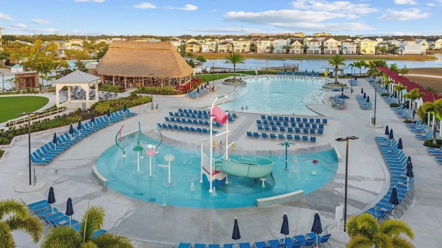 8045 Lost Shaker Ln, Kissimmee, FL 34747 - community pool with a gazebo and a residential view