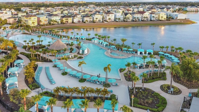 8045 Lost Shaker Ln, Kissimmee, FL 34747 - aerial perspective of suburban area featuring a large body of water