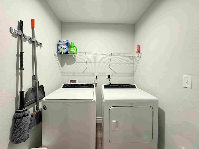 laundry room with washer and clothes dryer