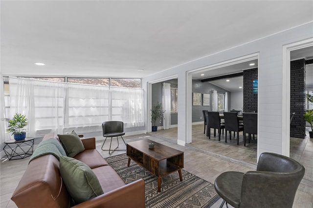 913 Moss Ln, Winter Park, FL 32789 - living room featuring baseboards and wood finished floors