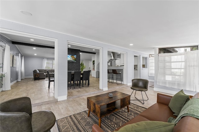 913 Moss Ln, Winter Park, FL 32789 - living area with baseboards and light wood-type flooring
