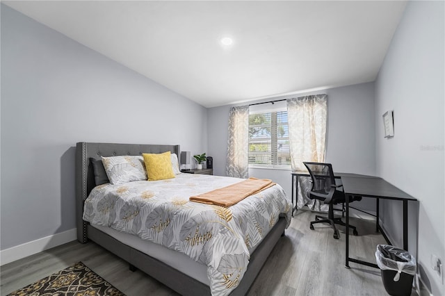 913 Moss Ln, Winter Park, FL 32789 - bedroom with wood finished floors and recessed lighting