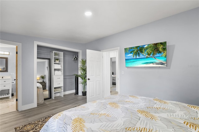 913 Moss Ln, Winter Park, FL 32789 - bedroom featuring wood finished floors, a closet, and recessed lighting
