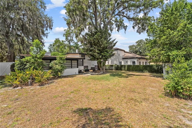 913 Moss Ln, Winter Park, FL 32789 - fenced backyard featuring a patio area