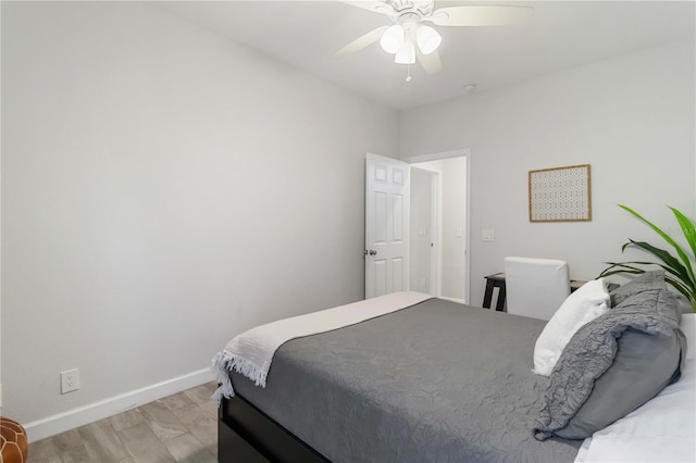 18 S D St, Lake Worth, FL 33460 - bedroom with light wood-type flooring, baseboards, and ceiling fan