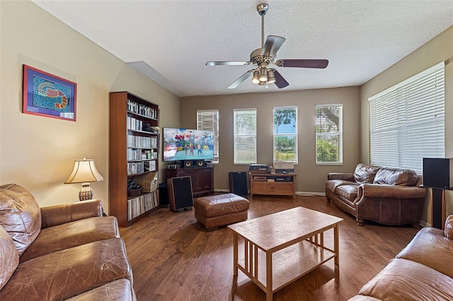 4813 River Gem Ave, Windermere, FL 34786 - living area with a ceiling fan, wood finished floors, and a textured ceiling