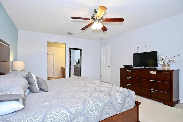 bedroom featuring light carpet and ceiling fan