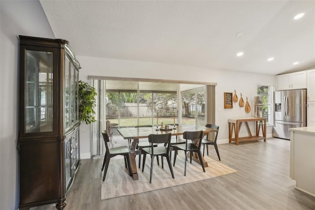 620 Fruitwood Ave, Winter Springs, FL 32708 - dining room featuring light wood-style flooring, baseboards, and recessed lighting